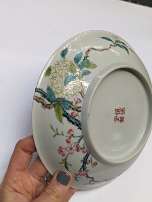 Lot 131 - A PAIR OF CHINESE FAMILLE-ROSE 'FLOWER AND BUTTERFLY' DISHES