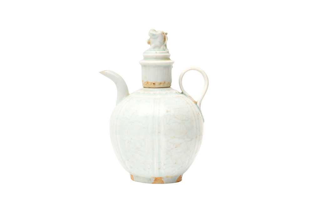 Lot 454 - A CHINESE SONG-STYLE QINGBAI EWER AND COVER
