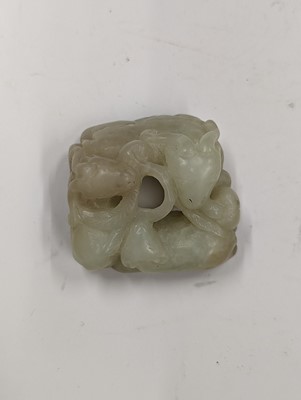 Lot 122 - A CHINESE PALE-CELADON JADE SANYANG 'RAMS'  GROUP CARVING