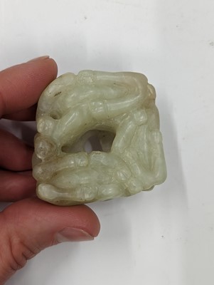 Lot 122 - A CHINESE PALE-CELADON JADE SANYANG 'RAMS'  GROUP CARVING