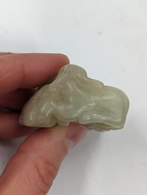 Lot 122 - A CHINESE PALE-CELADON JADE SANYANG 'RAMS'  GROUP CARVING