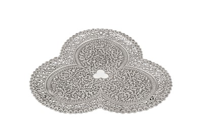 Lot 255 - AN ANGLO-INDIAN UNMARKED SILVER TEA TRAY