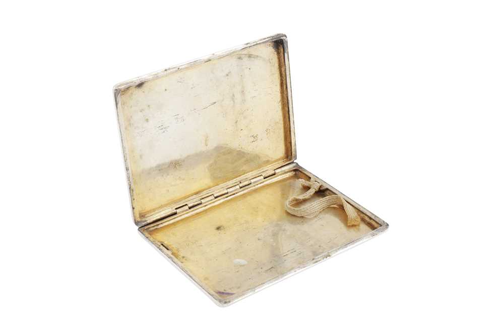 Lot 147 - AN ENGRAVED SILVER CIGARETTE CASE