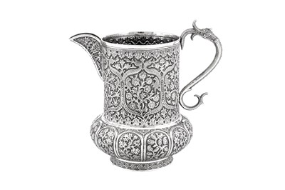 Lot 254 - AN ANGLO-INDIAN UNMARKED SILVER WATER JUG