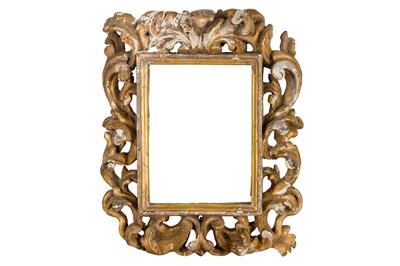 Lot 108 - AN ITALIAN VENETIAN 17/18TH CENTURY CARVED, PIERCED AND GILDED FRAME