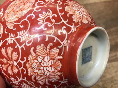 Lot 690 - A CHINESE IRON-RED 'LOTUS SCROLL' BOWL