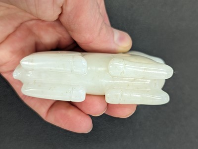 Lot 121 - A CHINESE WHITE JADE CARVING OF A DEER