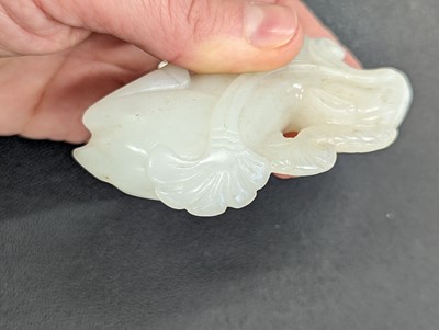 Lot 121 - A CHINESE WHITE JADE CARVING OF A DEER