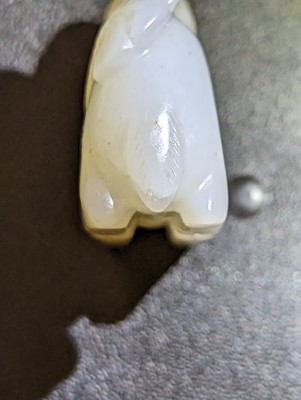 Lot 121 - A CHINESE WHITE JADE CARVING OF A DEER