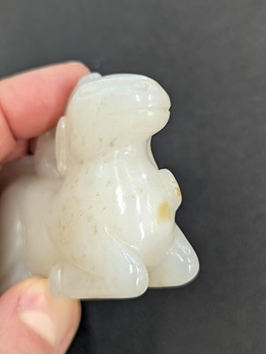 Lot 121 - A CHINESE WHITE JADE CARVING OF A DEER