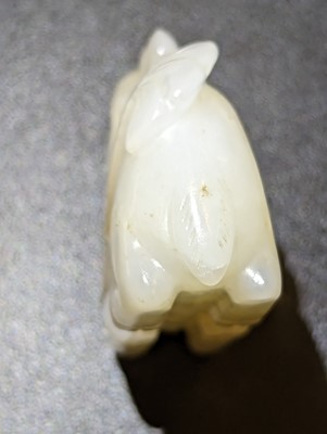 Lot 121 - A CHINESE WHITE JADE CARVING OF A DEER