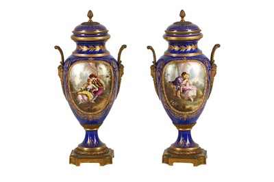 Lot 1574 - A PAIR OF FRENCH SEVRES STYLE PORCELAIN URNS AND GILT METAL URNS, 20TH CENTURY