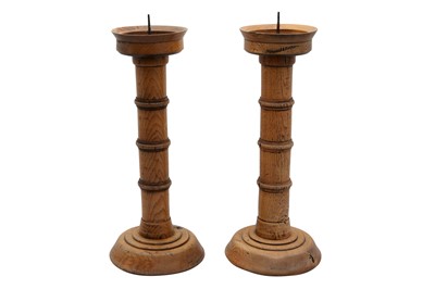 Lot 1559 - A PAIR OF TURNED BLEACHED OAK PRICKET CANDLESTICKS