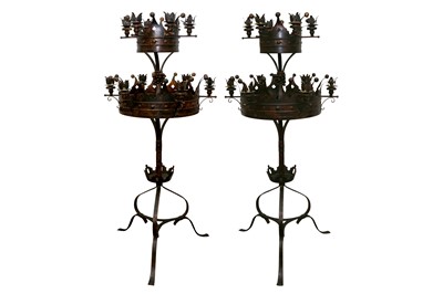 Lot 1562 - A PAIR OF GOTHIC INSPIRED FLOOR STANDING CANDELABRA