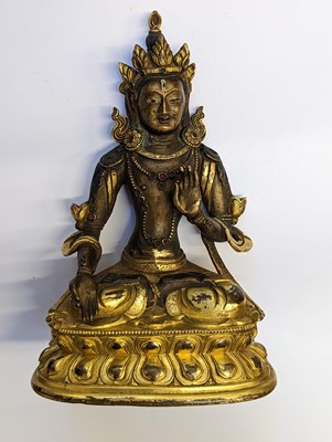 Lot 355 - A SINO-TIBETAN GILT-BRONZE FIGURE OF BUDDHA AMITAYUS