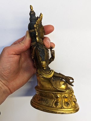 Lot 355 - A SINO-TIBETAN GILT-BRONZE FIGURE OF BUDDHA AMITAYUS