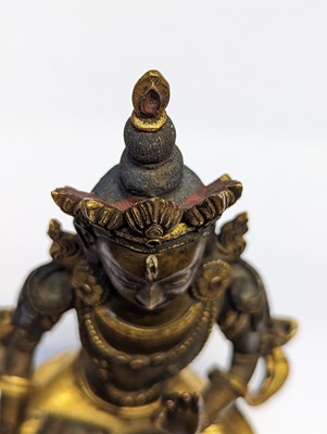 Lot 355 - A SINO-TIBETAN GILT-BRONZE FIGURE OF BUDDHA AMITAYUS