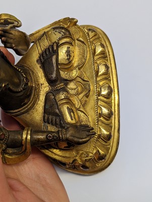 Lot 355 - A SINO-TIBETAN GILT-BRONZE FIGURE OF BUDDHA AMITAYUS