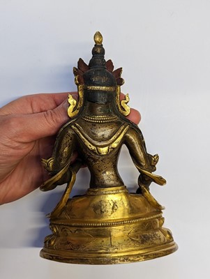 Lot 355 - A SINO-TIBETAN GILT-BRONZE FIGURE OF BUDDHA AMITAYUS