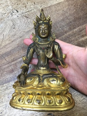 Lot 355 - A SINO-TIBETAN GILT-BRONZE FIGURE OF BUDDHA AMITAYUS