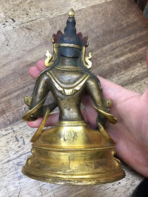 Lot 355 - A SINO-TIBETAN GILT-BRONZE FIGURE OF BUDDHA AMITAYUS