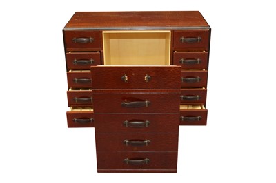 Lot 1806 - A CONTEMPORARY METAMORPHIC QUILTED MAPLE VENEERED DESK AND CHAIR