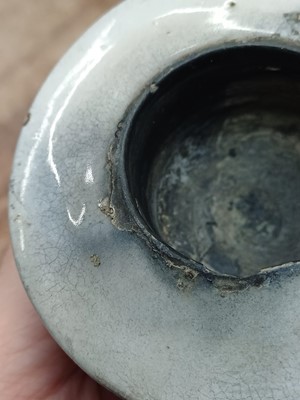 Lot 658 - A SMALL CHINESE CIZHOU GREY-GLAZED LAMP BASE