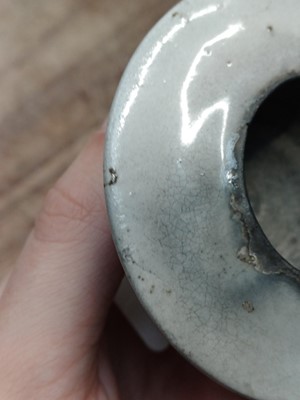 Lot 658 - A SMALL CHINESE CIZHOU GREY-GLAZED LAMP BASE