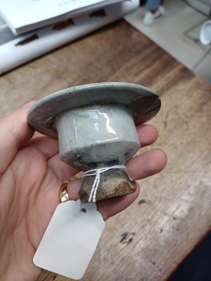 Lot 658 - A SMALL CHINESE CIZHOU GREY-GLAZED LAMP BASE