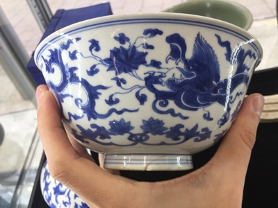 Lot 100 - A CHINESE BLUE AND WHITE 'DRAGON AND LOTUS' BOWL