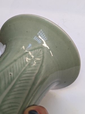 Lot 98 - A CHINESE CELADON-GLAZED 'PEONY' YEN YEN VASE