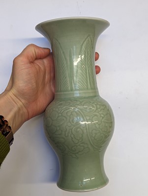 Lot 98 - A CHINESE CELADON-GLAZED 'PEONY' YEN YEN VASE