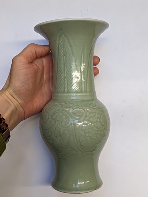 Lot 98 - A CHINESE CELADON-GLAZED 'PEONY' YEN YEN VASE