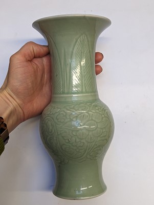 Lot 98 - A CHINESE CELADON-GLAZED 'PEONY' YEN YEN VASE