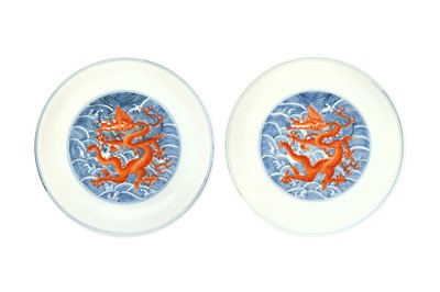 Lot 60 - A PAIR OF FINE CHINESE BLUE AND WHITE AND IRON-RED 'DRAGON' DISHES