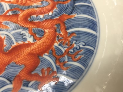 Lot 60 - A PAIR OF FINE CHINESE BLUE AND WHITE AND IRON-RED 'DRAGON' DISHES