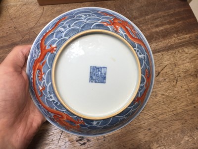 Lot 60 - A PAIR OF FINE CHINESE BLUE AND WHITE AND IRON-RED 'DRAGON' DISHES