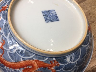 Lot 60 - A PAIR OF FINE CHINESE BLUE AND WHITE AND IRON-RED 'DRAGON' DISHES