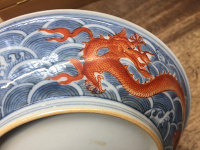 Lot 60 - A PAIR OF FINE CHINESE BLUE AND WHITE AND IRON-RED 'DRAGON' DISHES