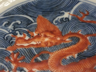 Lot 60 - A PAIR OF FINE CHINESE BLUE AND WHITE AND IRON-RED 'DRAGON' DISHES