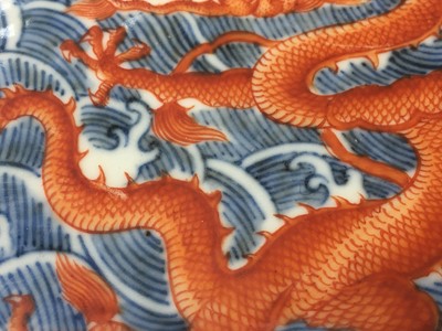 Lot 60 - A PAIR OF FINE CHINESE BLUE AND WHITE AND IRON-RED 'DRAGON' DISHES