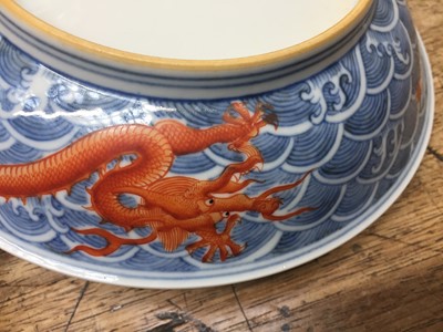 Lot 60 - A PAIR OF FINE CHINESE BLUE AND WHITE AND IRON-RED 'DRAGON' DISHES