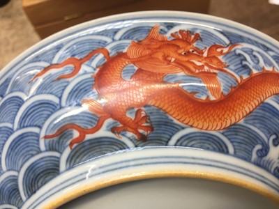 Lot 60 - A PAIR OF FINE CHINESE BLUE AND WHITE AND IRON-RED 'DRAGON' DISHES