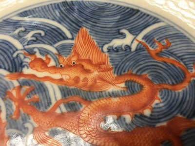 Lot 60 - A PAIR OF FINE CHINESE BLUE AND WHITE AND IRON-RED 'DRAGON' DISHES