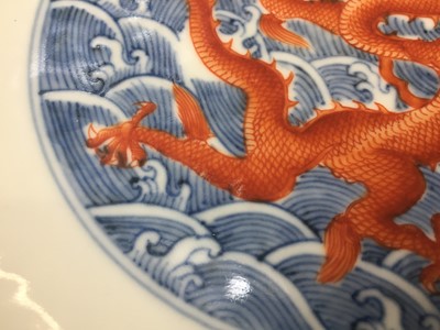 Lot 60 - A PAIR OF FINE CHINESE BLUE AND WHITE AND IRON-RED 'DRAGON' DISHES