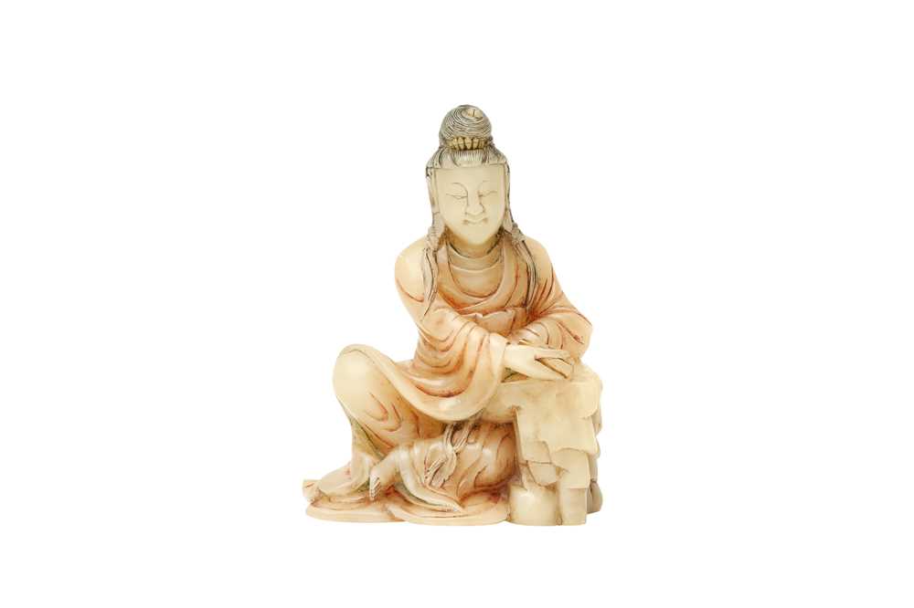 Lot 51 - A CHINESE SOAPSTONE FIGURE OF GUANYIN