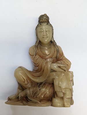 Lot 51 - A CHINESE SOAPSTONE FIGURE OF GUANYIN