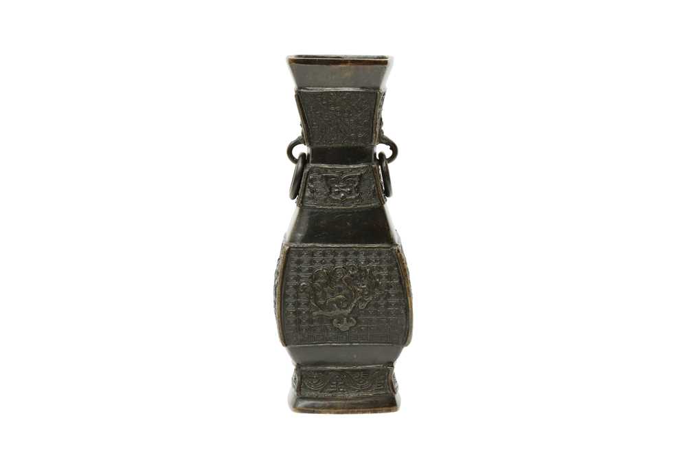 Lot 62 - A CHINESE BRONZE ARCHAISTIC TWIN-HANDLED VASE