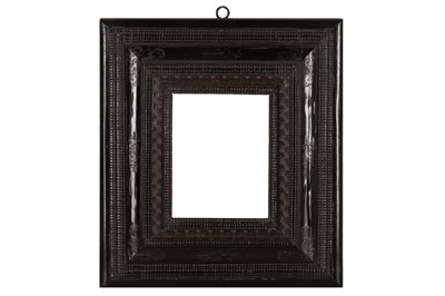 Lot 107 - A NORTHERN ITALIAN 17TH CENTURY EBONISED REVERSE PROFILE RIPPLE FRAME