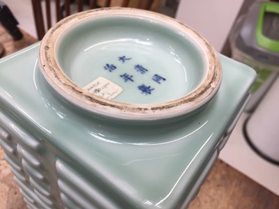 Lot 879 - A CHINESE CELADON-GLAZED 'EIGHT TRIGRAMS' VASE, CONG